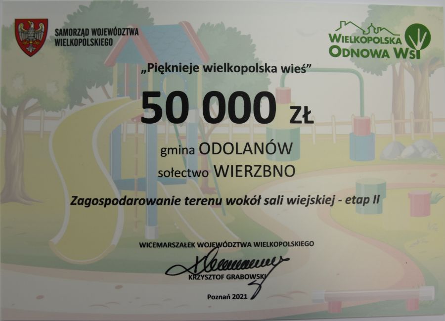 Dotacja dla Gminy i Miasta Odolanów w kwocie 50 000 zł na zagospodarowanie terenu wokół sali wiejskiej - etap II